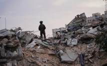 قائد فرقة غزة يهدد بالعودة للقتال داخل القطاع