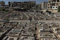 انهيار مبنى متهالك في مخيم اليرموك بدمشق بعد سنوات من الدمار